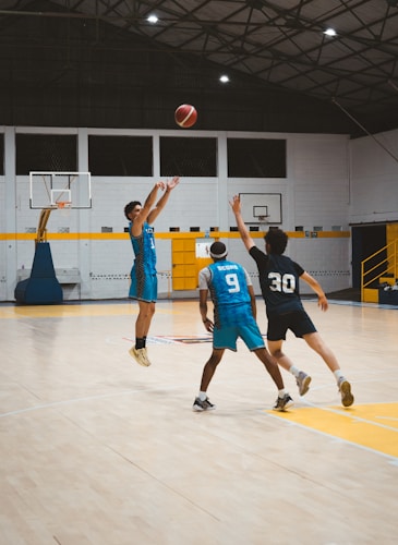 Basketball court with players
