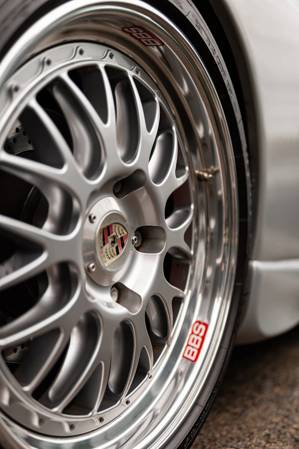 Close-up of a silver bbs alloy car wheel