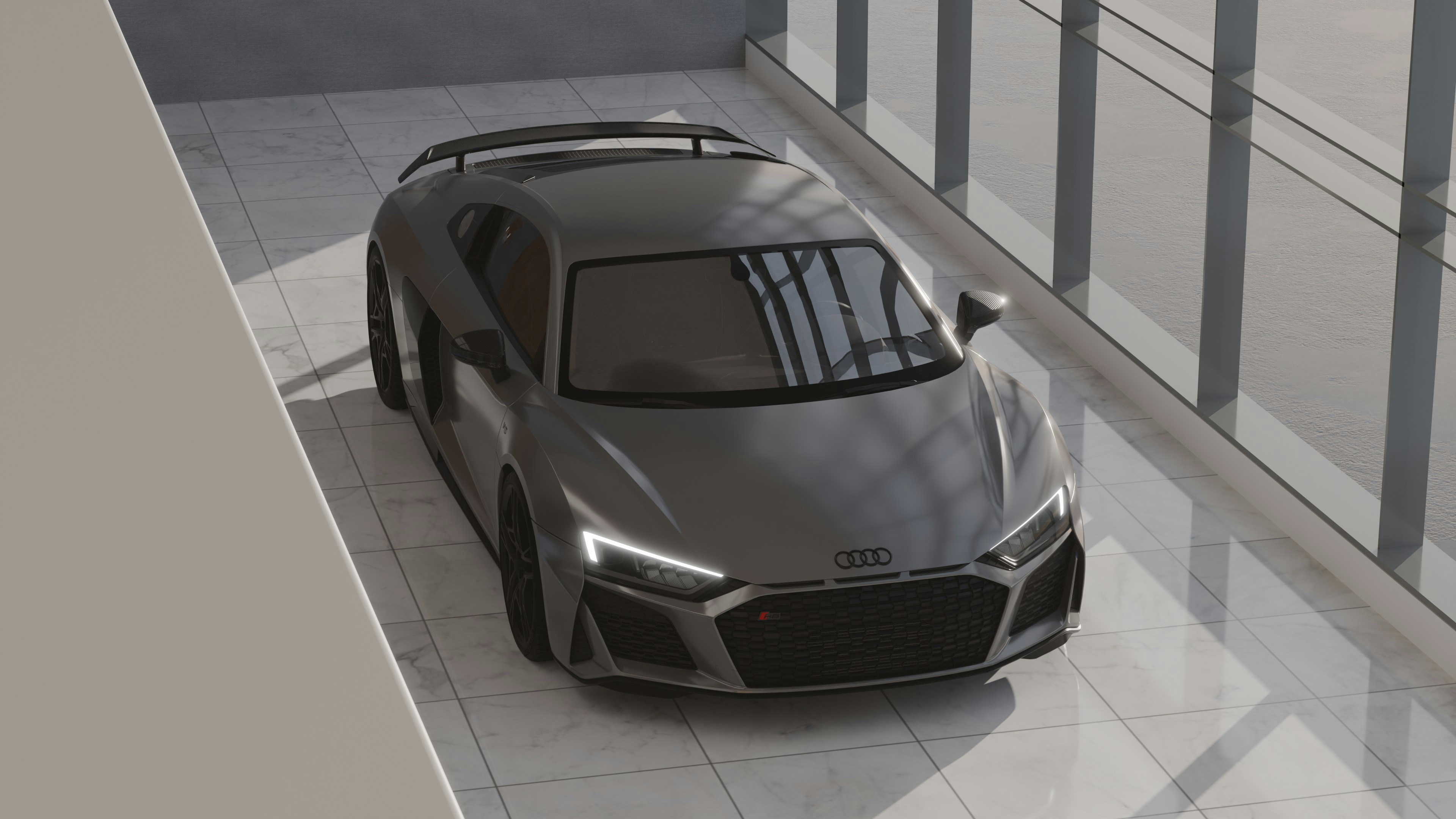 차량 실내 냄새 제거하는 쉬운 방법 - A sleek grey audi r8 parked indoors.
