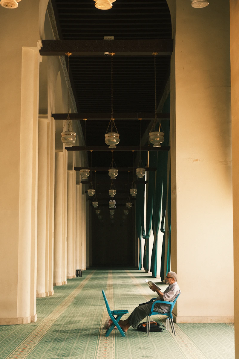 Person reading in mosque
