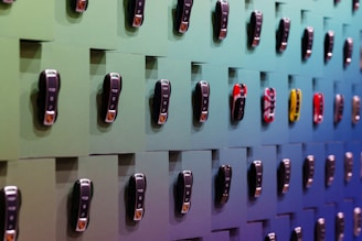 Many small electronic devices mounted on a wall.