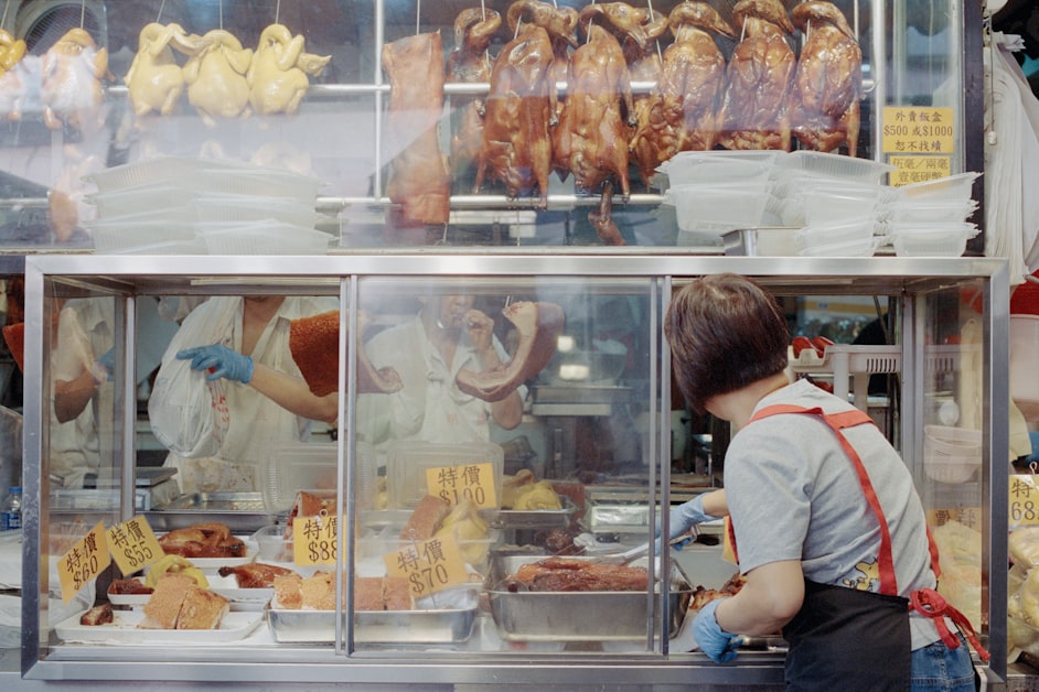 Roasted ducks hanging in the window of a Cantonese restaurant in Guangzhou