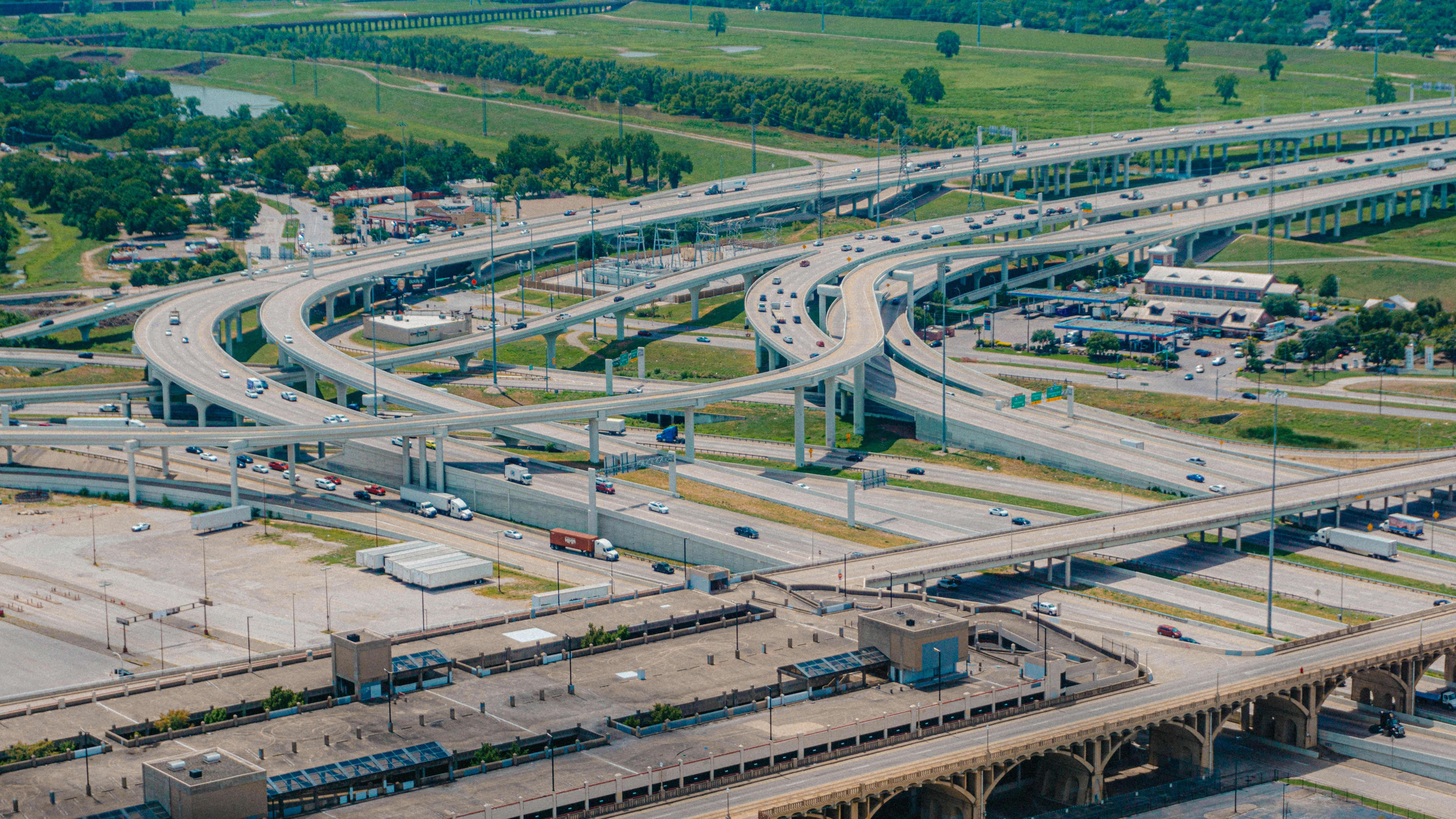 Complex highway interchange with multiple overpasses and ramps.