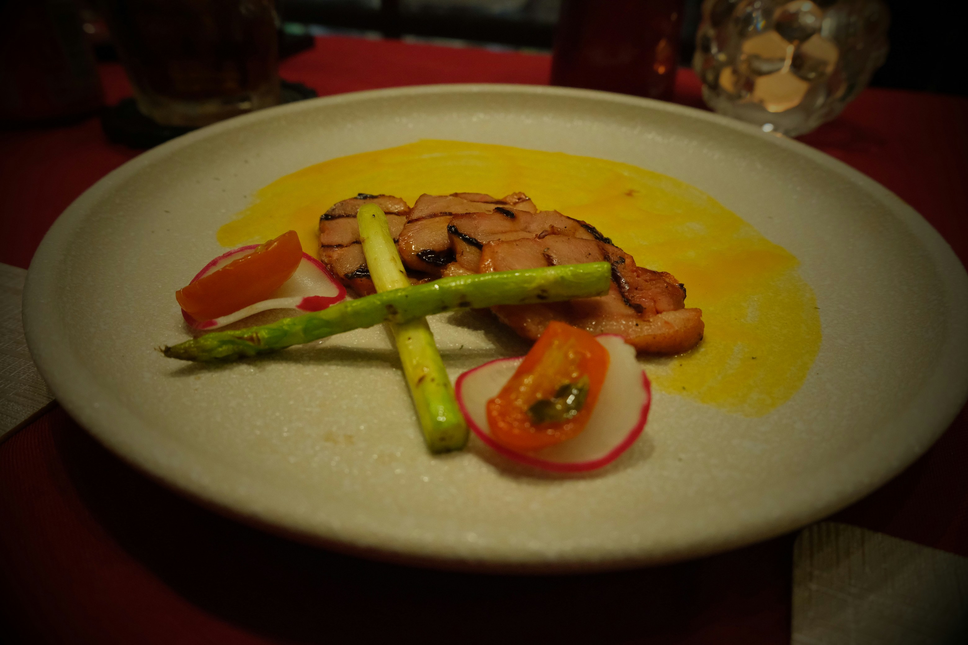 A beautifully plated, colorful dish, likely a gourmet appetizer, at a high-end restaurant - Chicago West Loop attractions