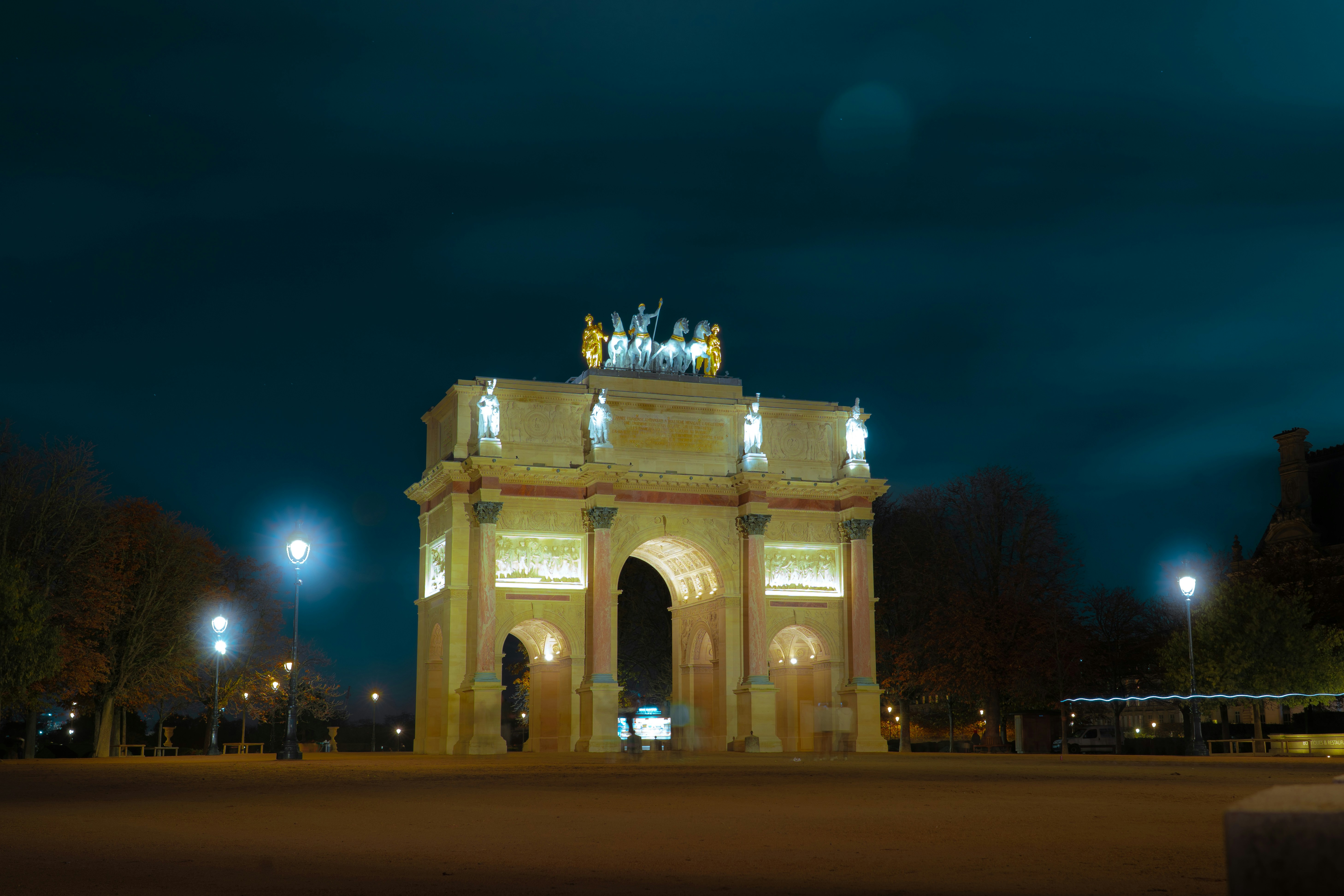 Arc de triomphe du carrousel illuminated at night