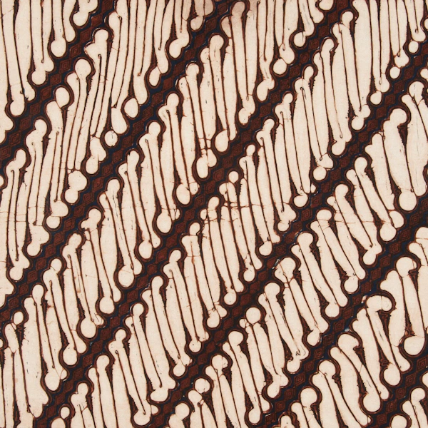 Diagonal pattern of brown lines on cream batik fabric