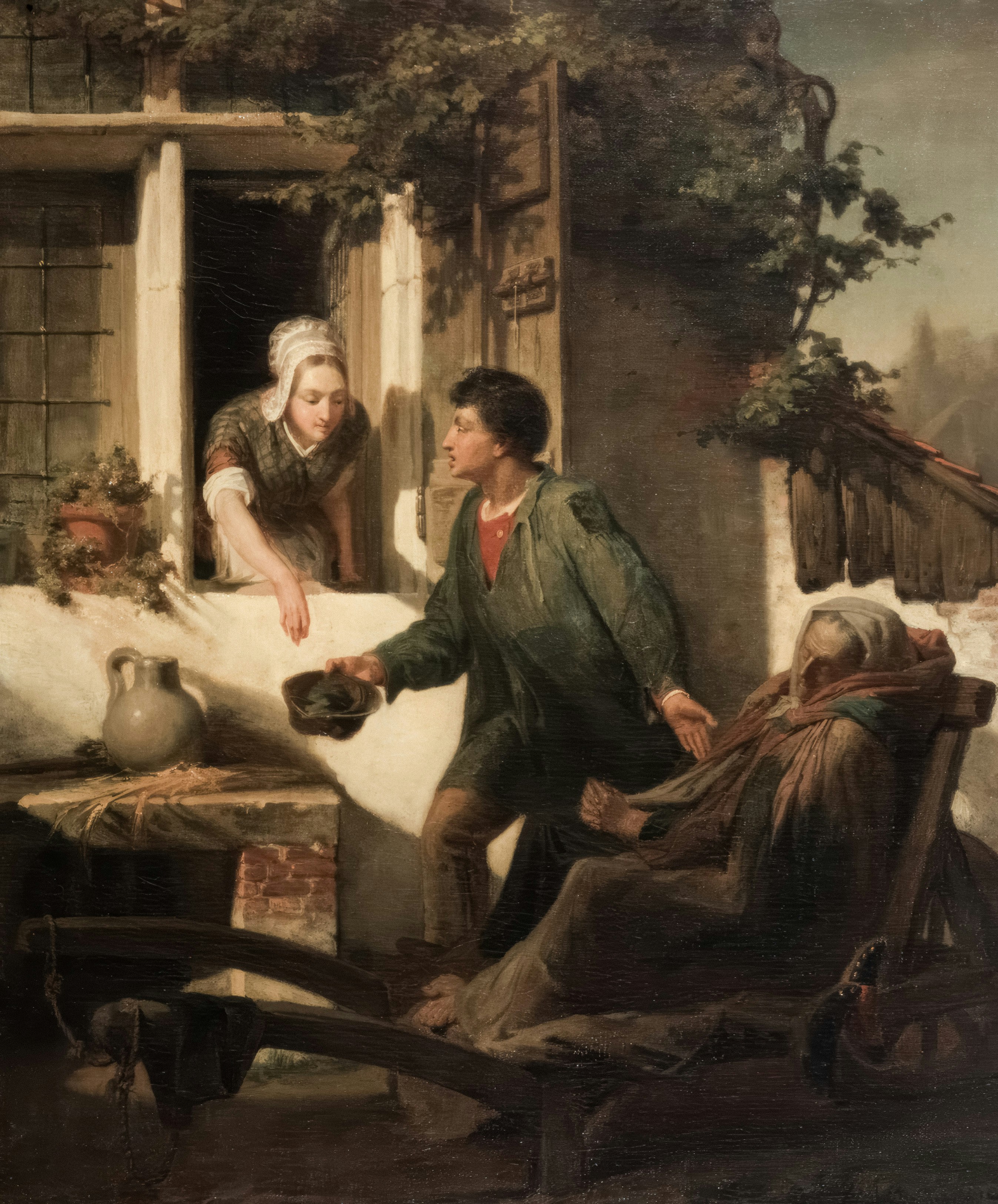 Hands holding a plant seedling.