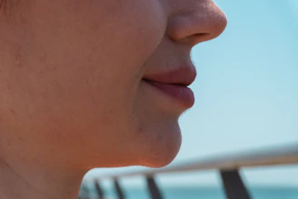 Close-up of a person's chin and mouth