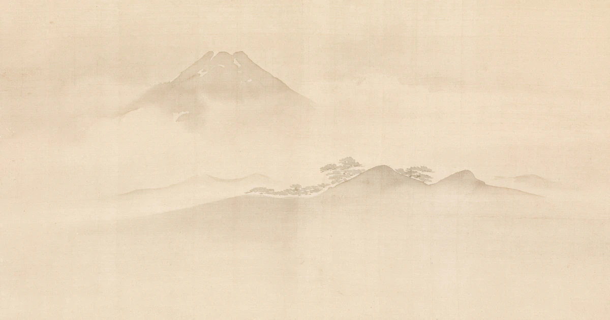 Traditional sumi-e ink wash of Mount Fuji wreathed in cloud, muted color on silk