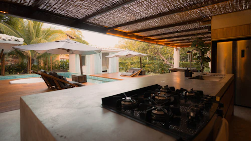 Beautiful finished outdoor kitchen and pool area