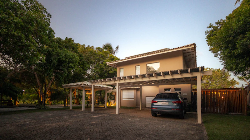 Car parked under a home carport
