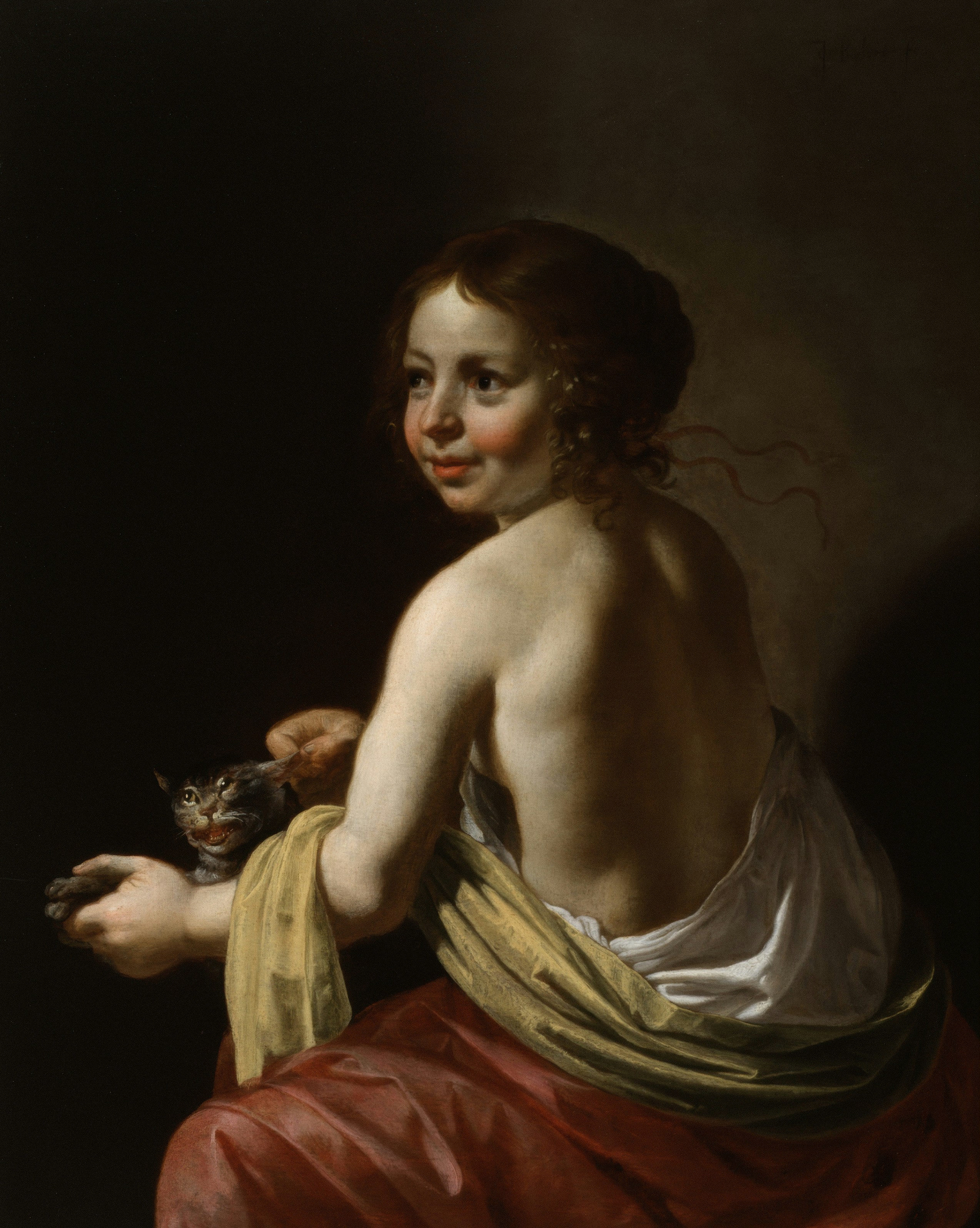 A young girl with a kitten and a bird