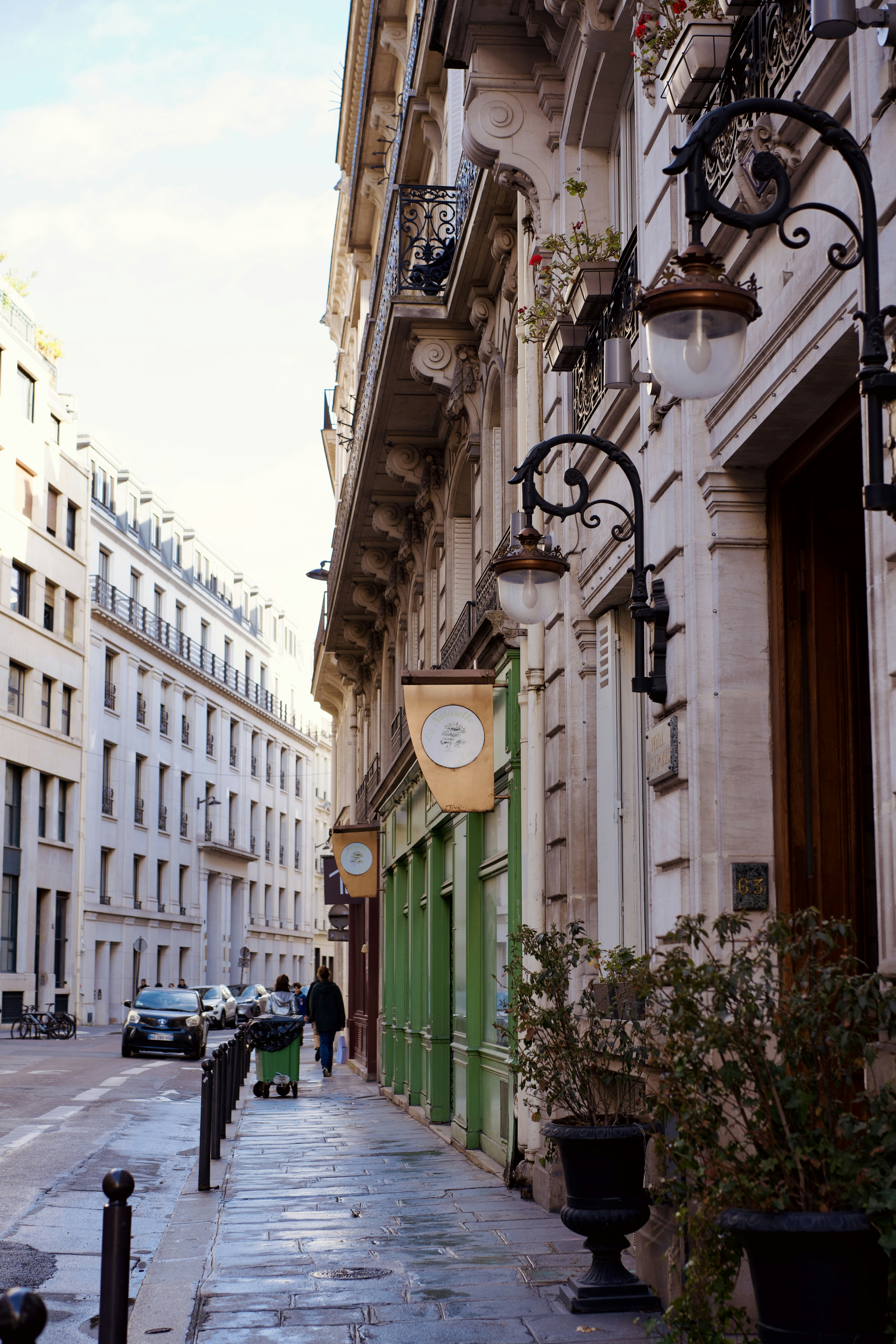 A european street with ornate lamps and buildings.