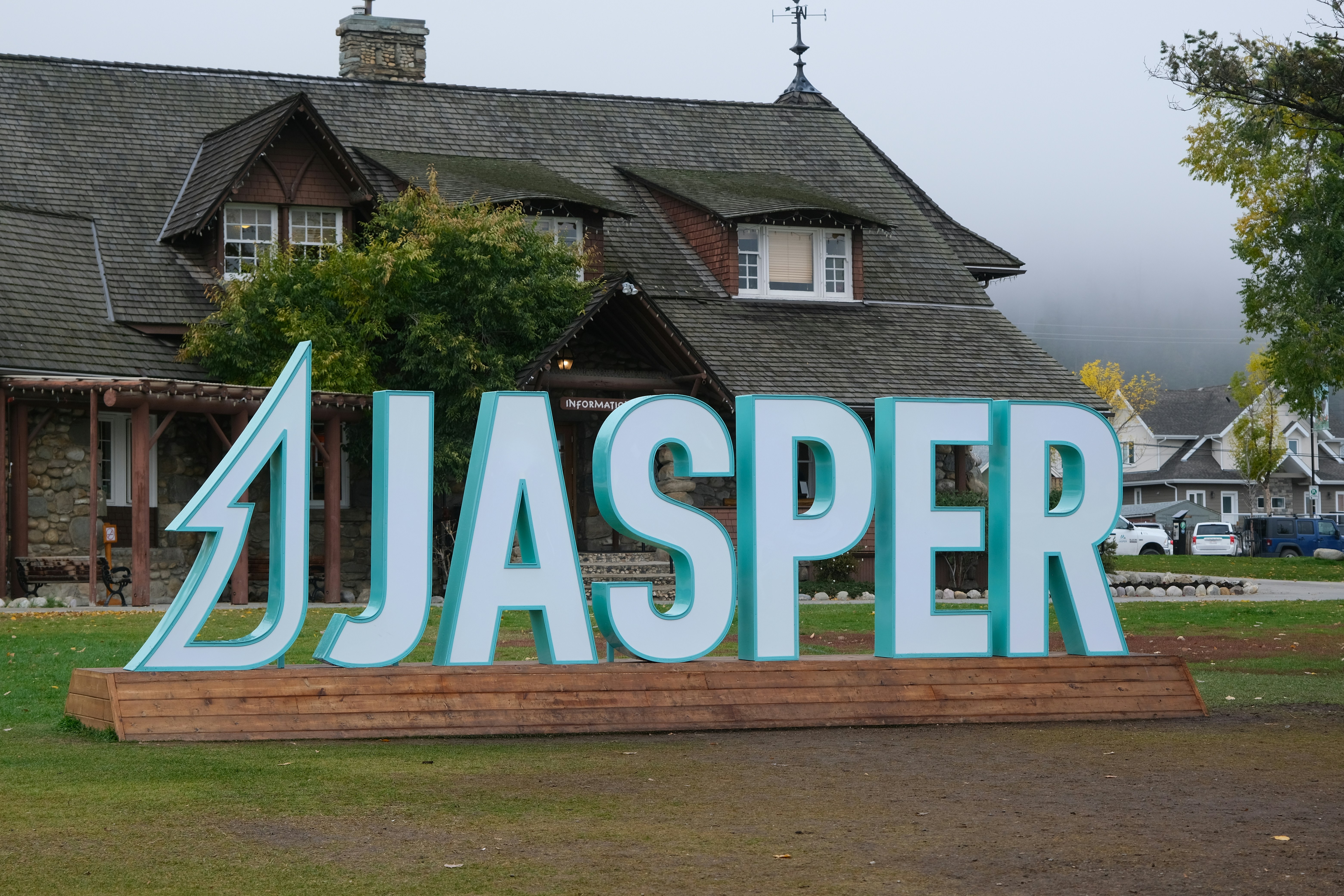 Large jasper sign in front of a building