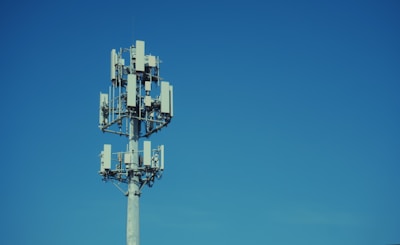 Cell tower against a clear blue sky
