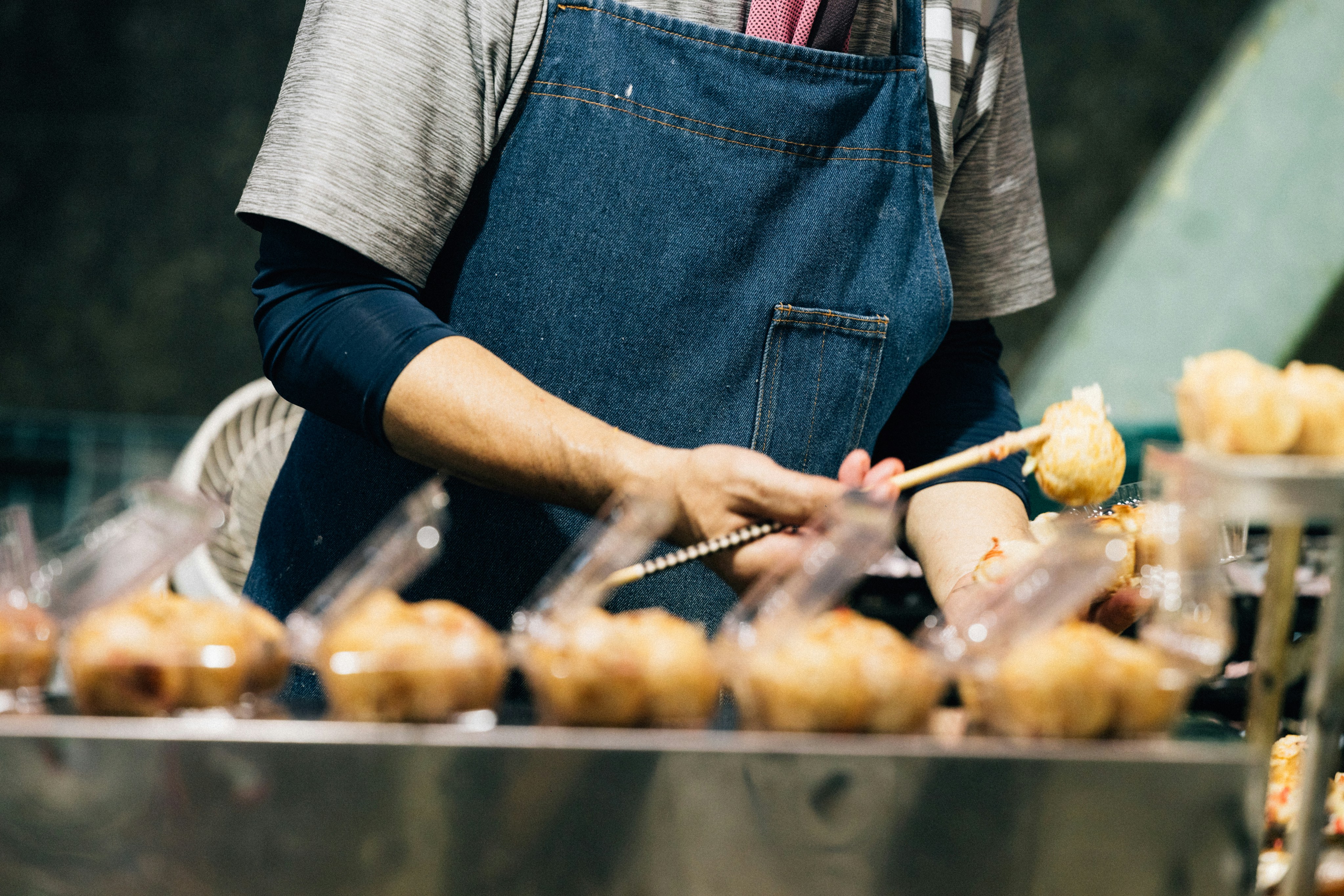 Priya Ramesh, founder of Kneaded with Love, baking in her kitchen