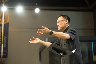 Man speaking passionately at a podium