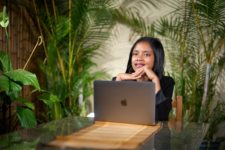 Young woman reviewing financial plans on her laptop