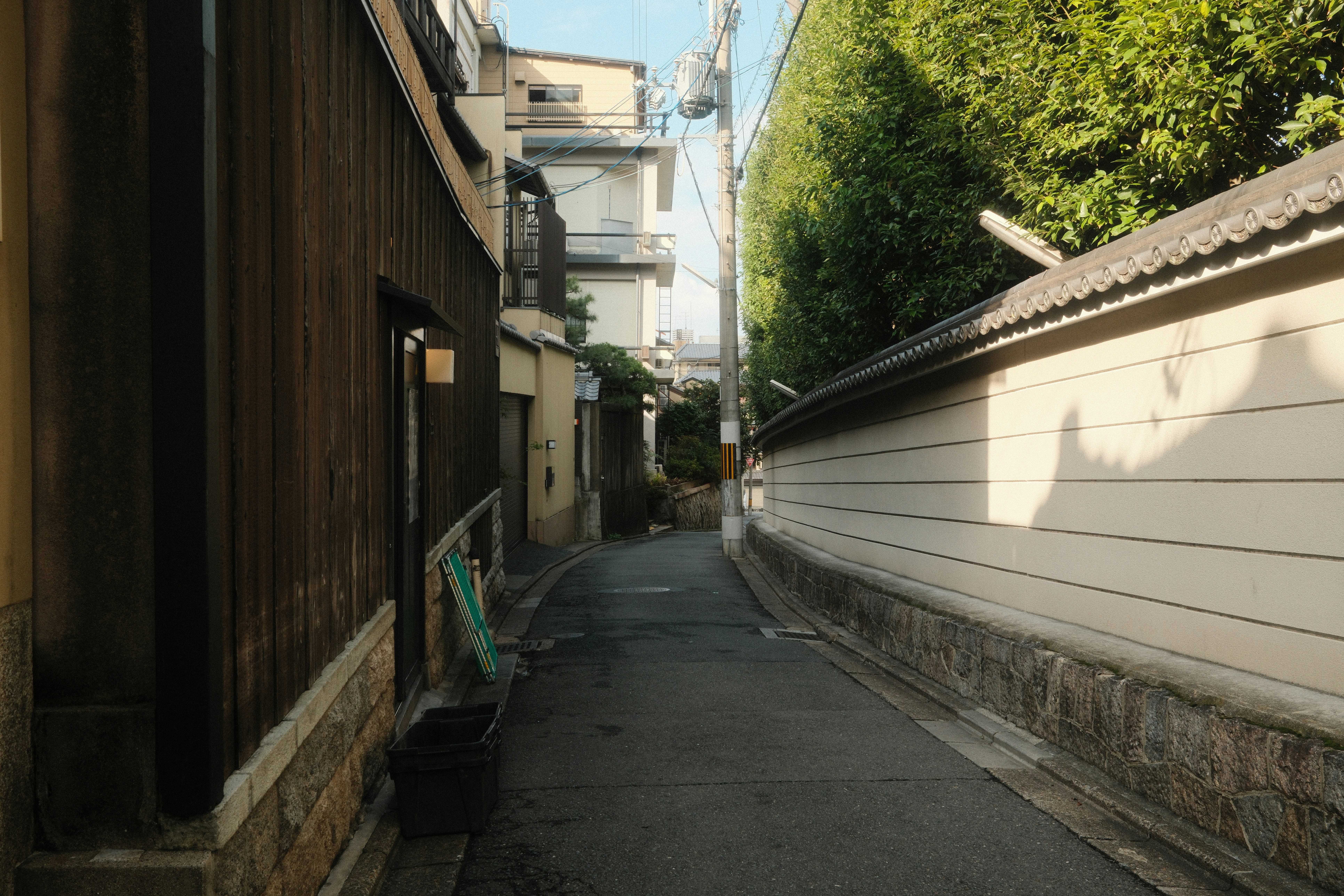 Narrow alleyway between traditional japanese buildings