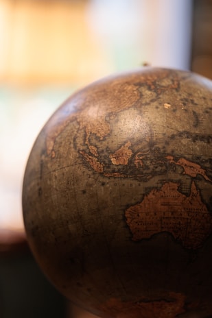 Close-up of an antique globe showing australia and australia