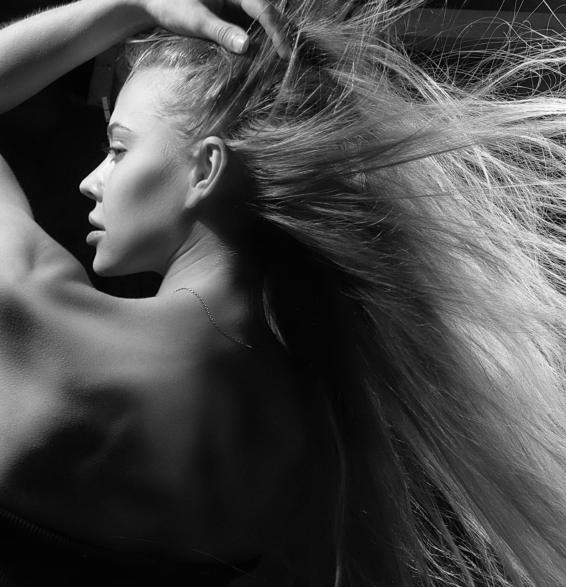 Woman with long hair blowing in the wind