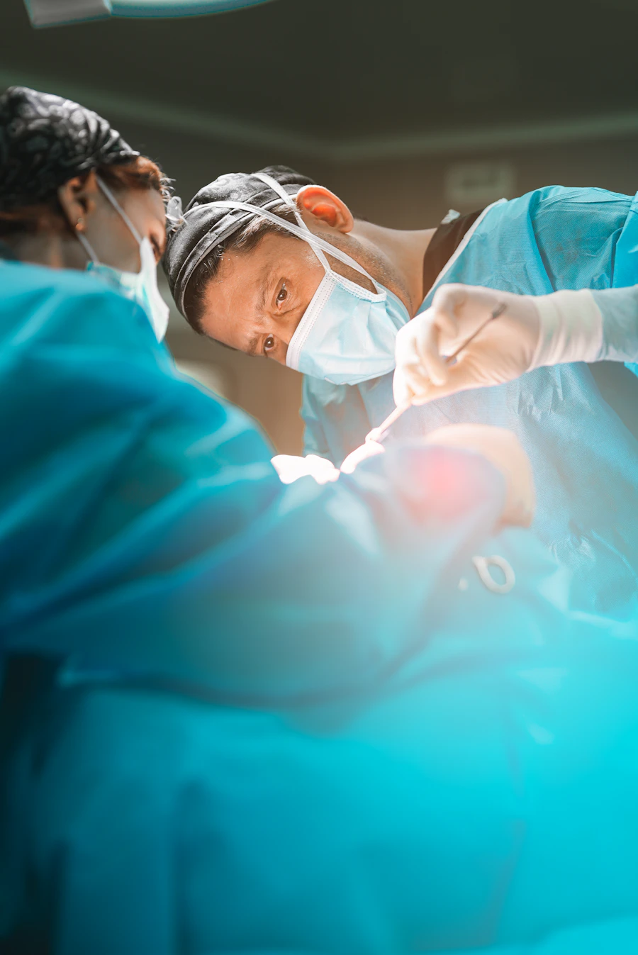 Surgical team in scrubs in an operating room
