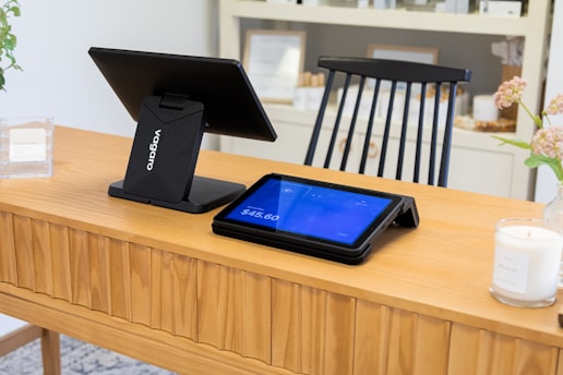 Point of sale system on a wooden counter.