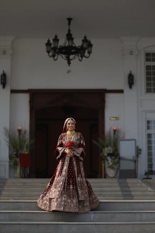 Indian bride with mehendi on her hands and glowing skin before her wedding