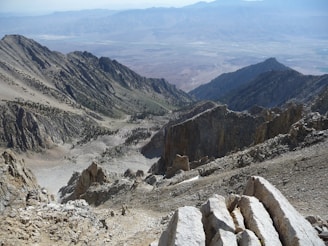 Rocky mountain pass overlooking a desert valley
