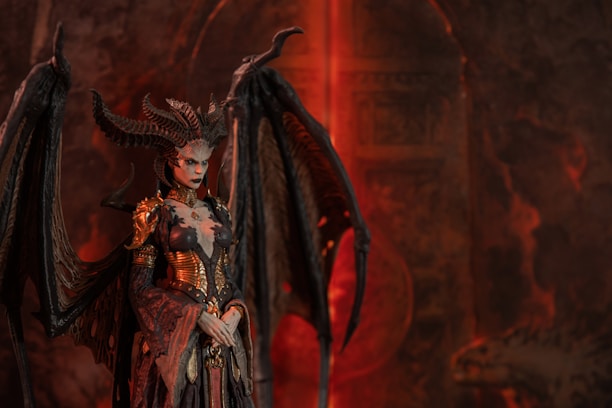 A demonic queen with large wings and horns.