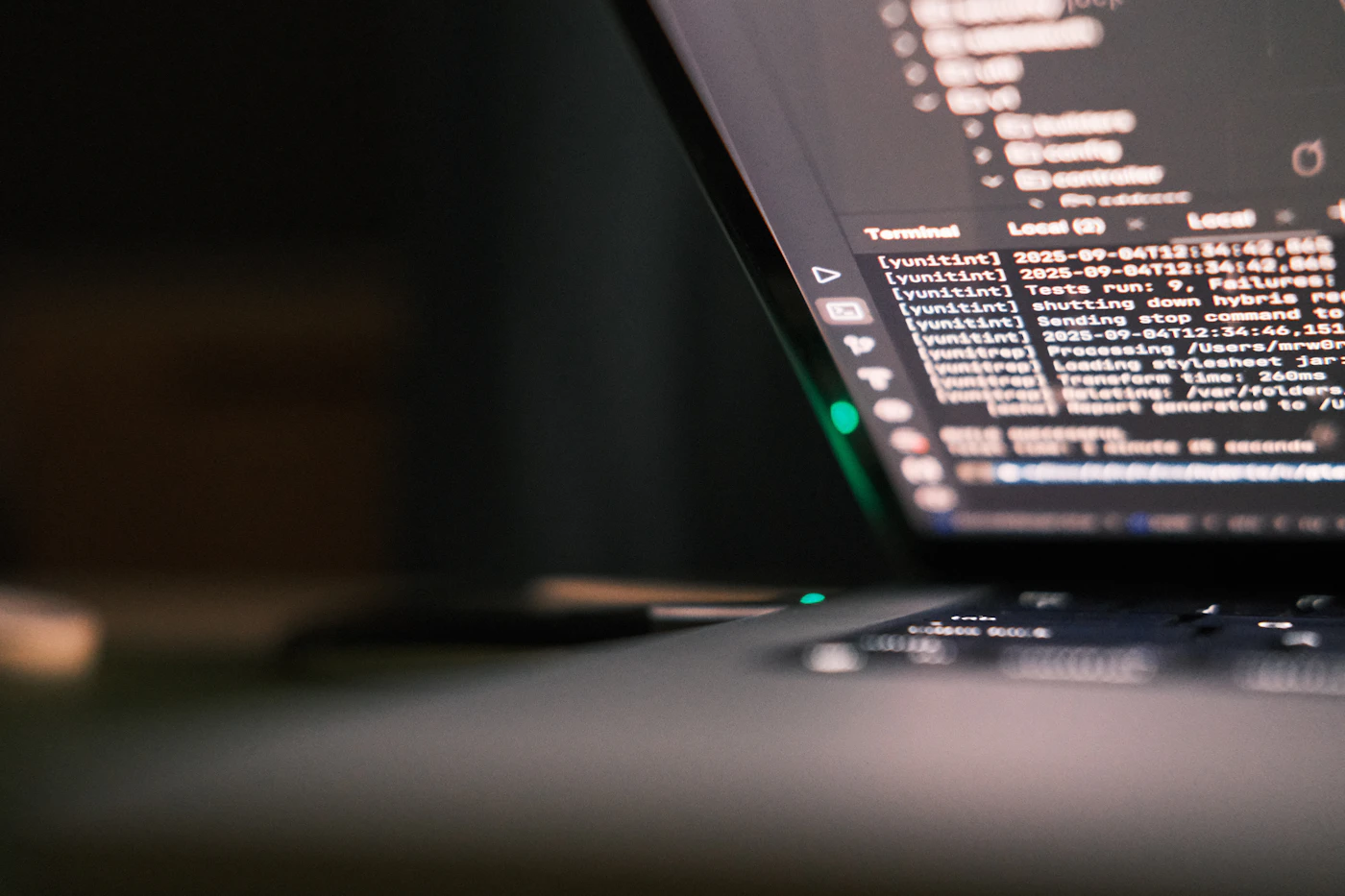 Laptop screen displaying lines of code