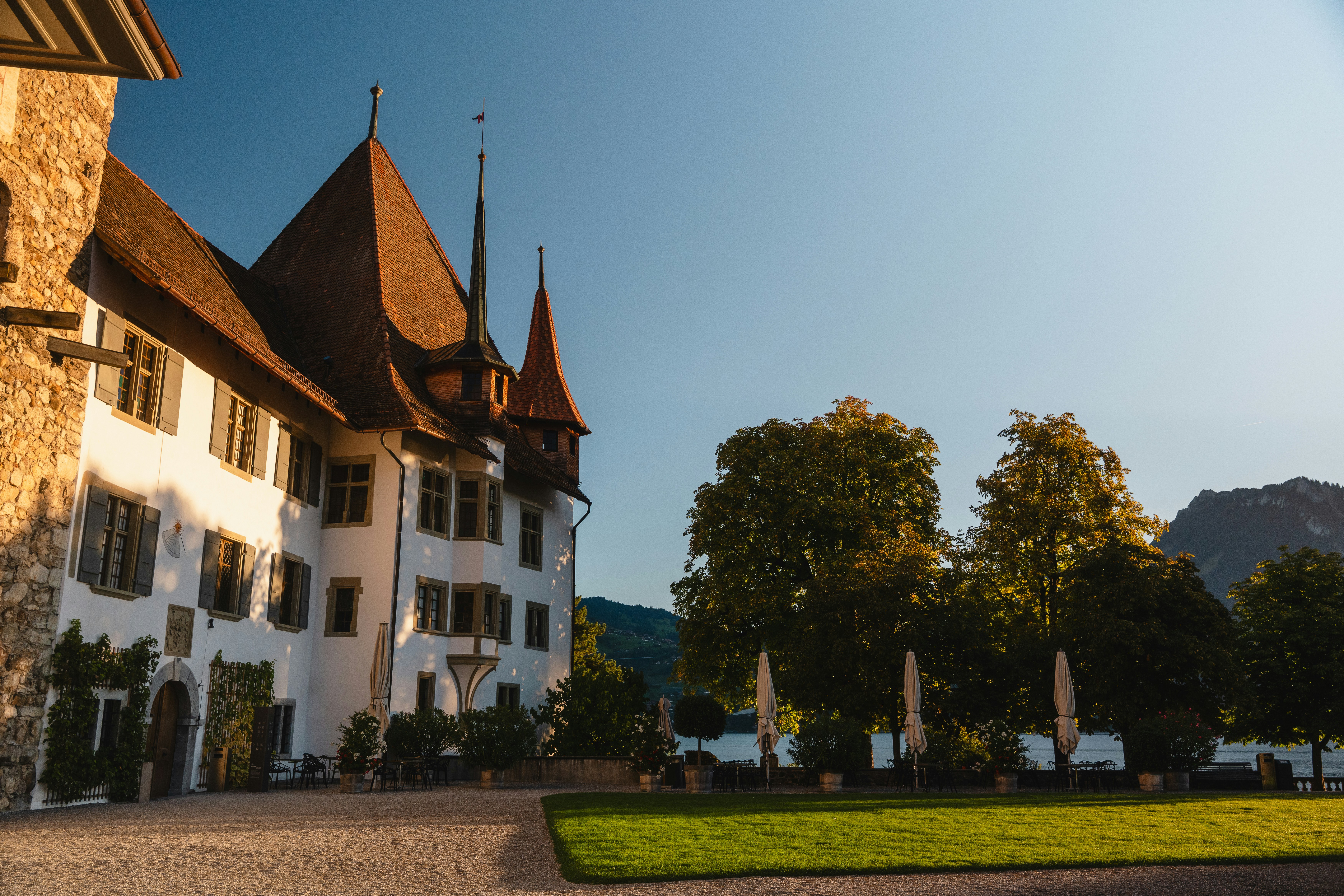 Historic castle with tall spires under a clear sky