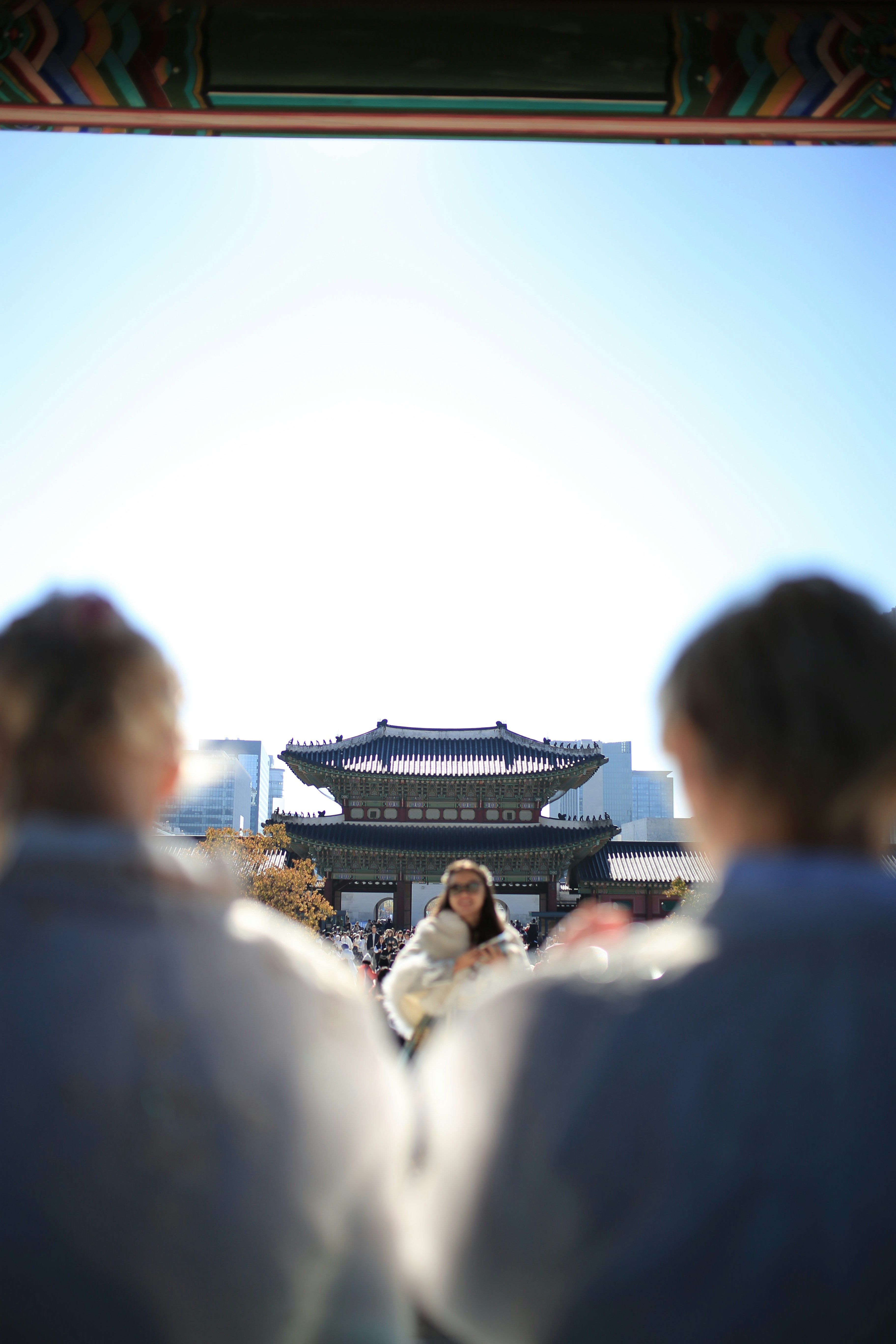 People in traditional clothing at gyeongbokgung palace