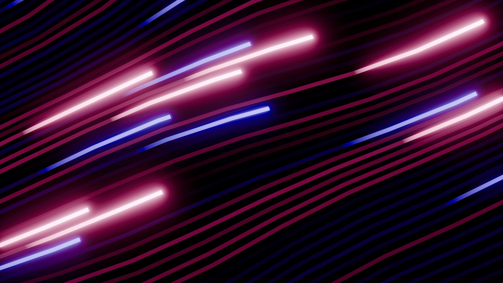 Abstract streaks of pink and blue neon lights.