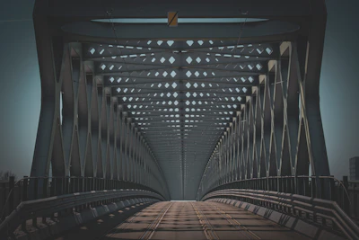 Perspective view of a steel truss bridge interior