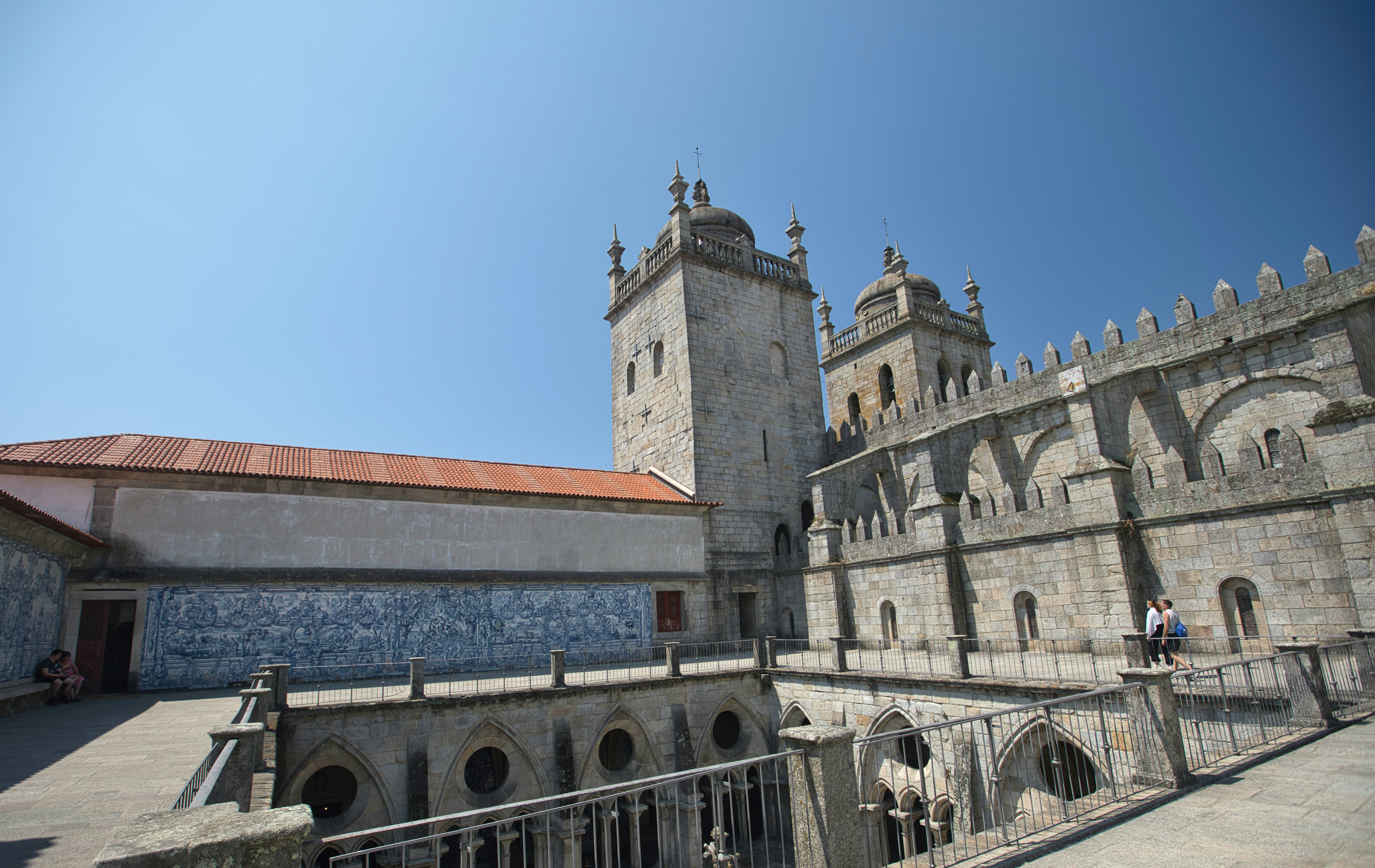 Historic stone cathedral with ornate architecture underpasses and towers.