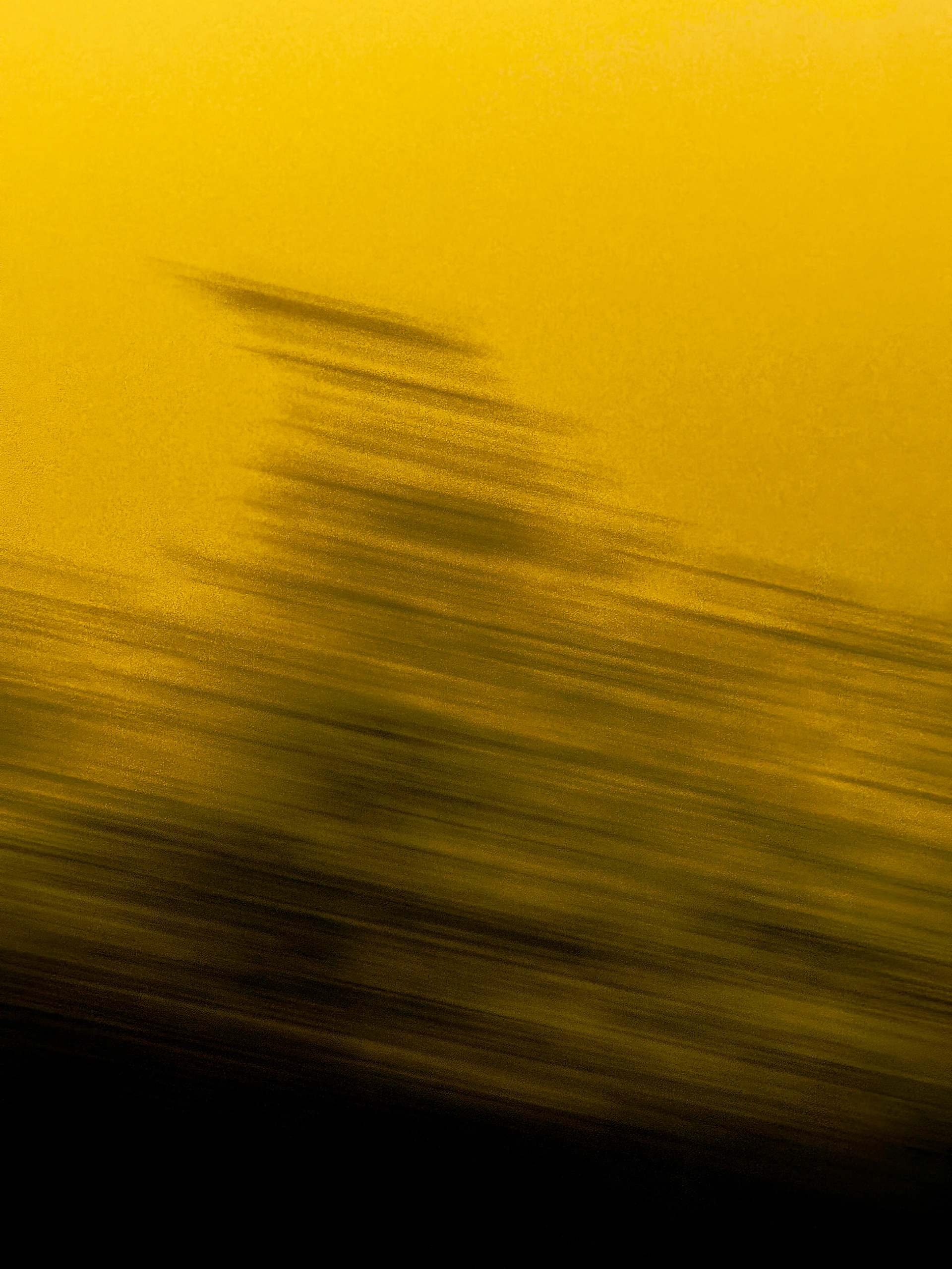 Abstract blurred yellow and black background