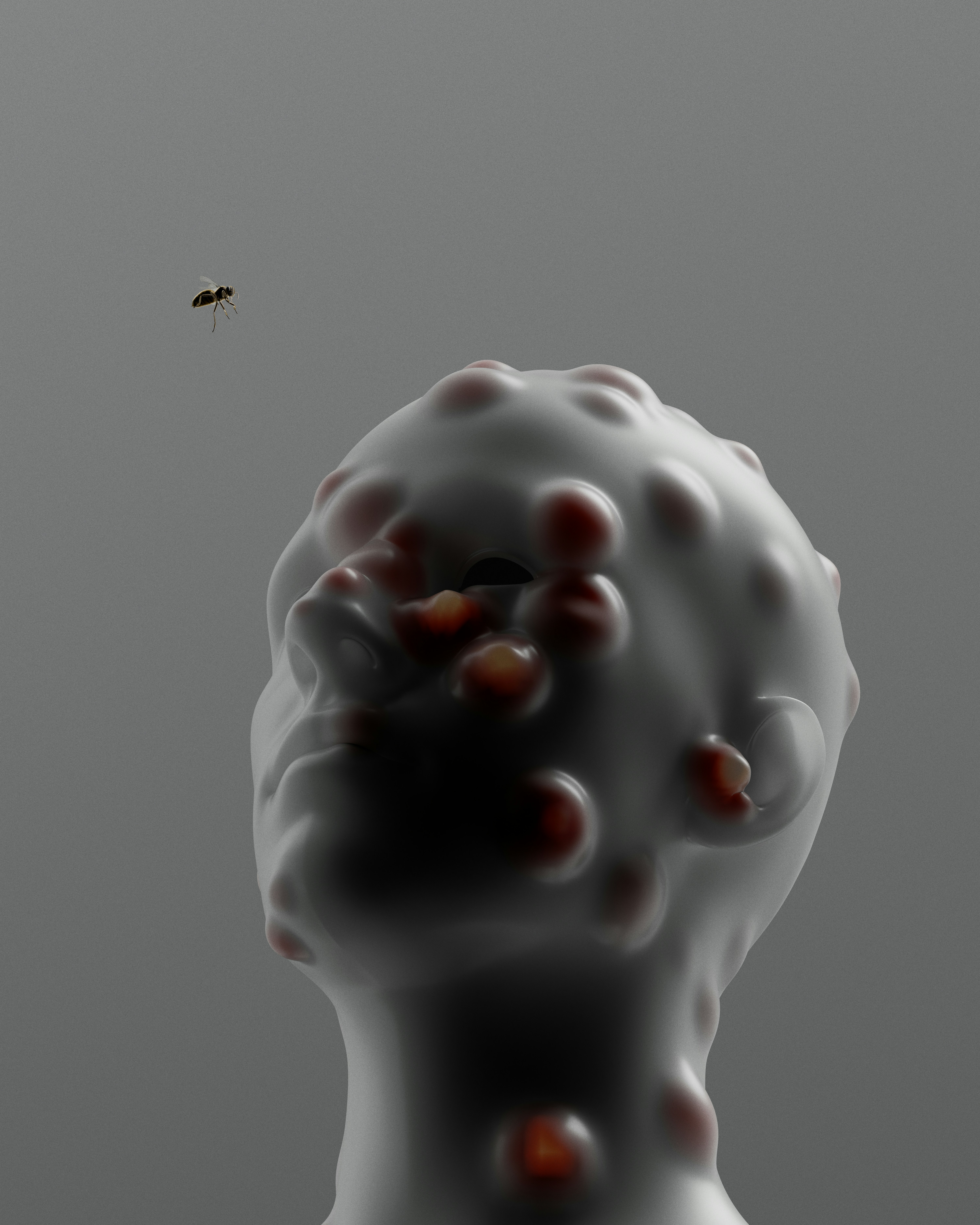 A fly hovers near a grotesque, bumpy head sculpture.