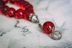 Red prayer beads with a crescent moon charm