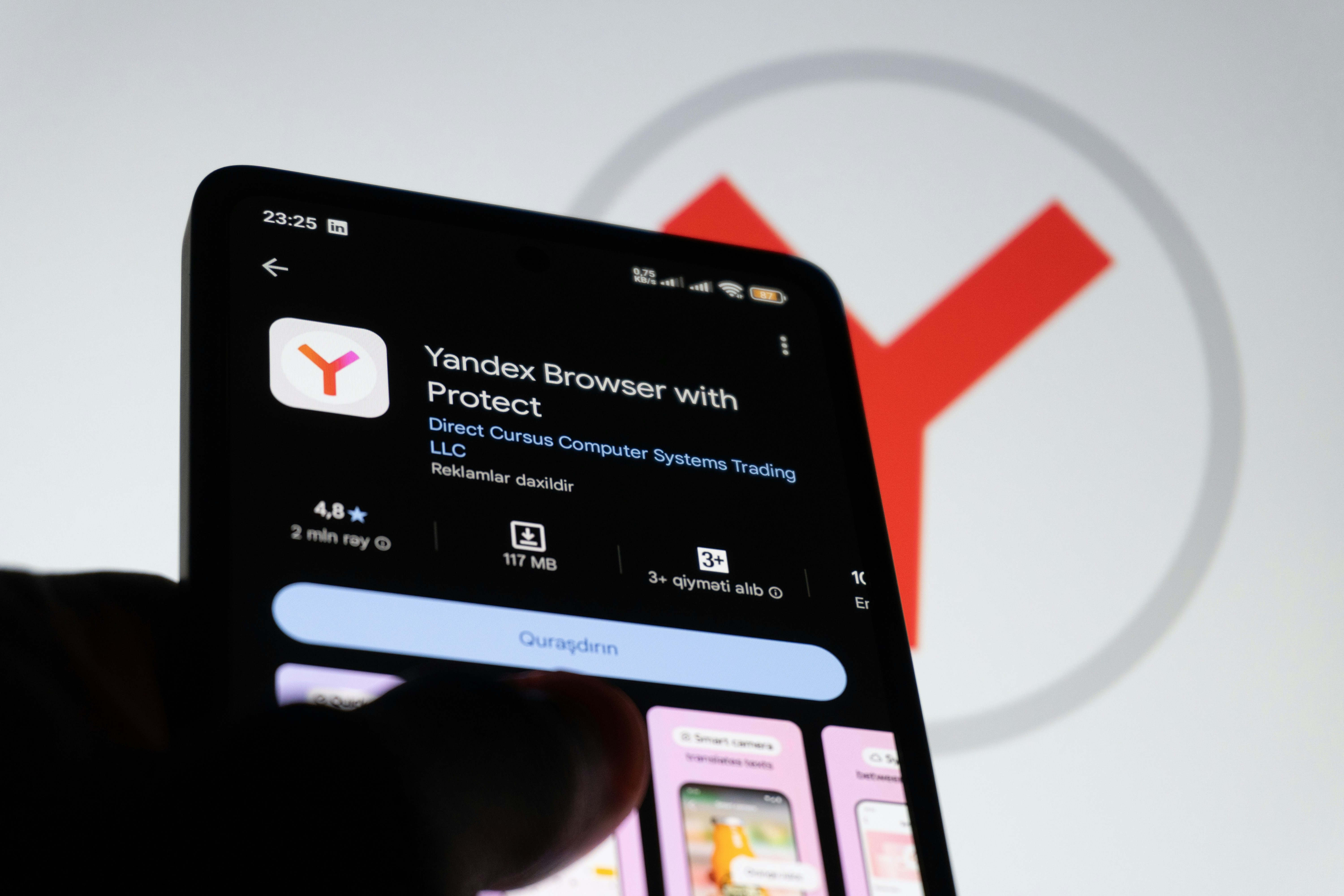 Smartphone displaying browser page on dark screen