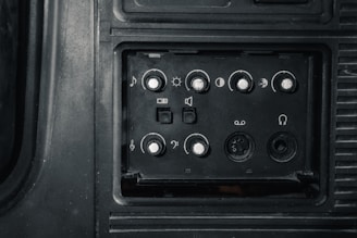 Close-up of old cassette player controls