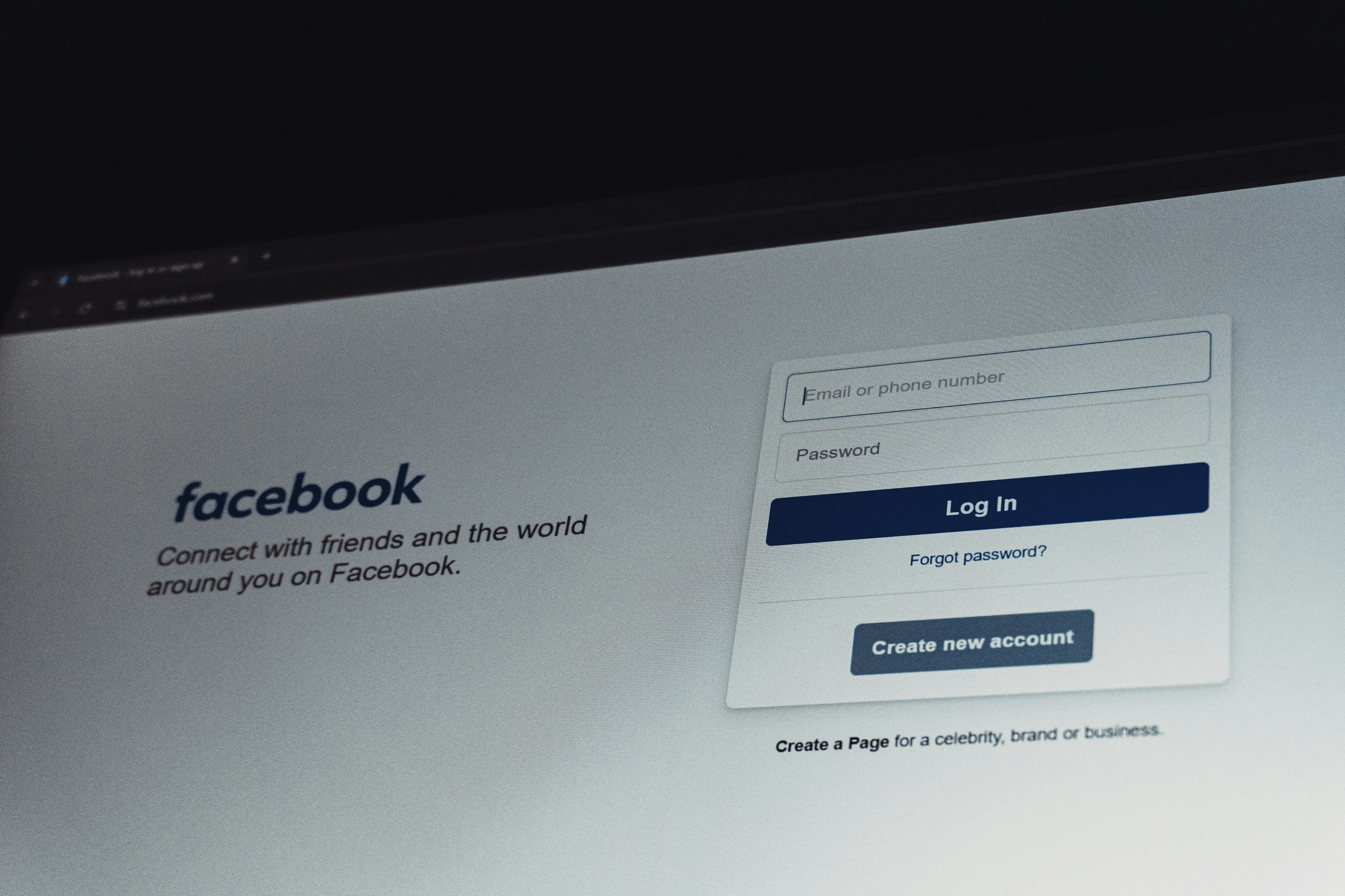 Facebook login screen on computer monitor