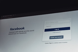 Facebook login screen on a computer monitor.