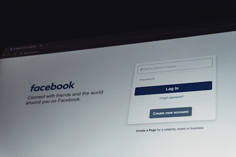 Facebook login screen on a computer monitor.