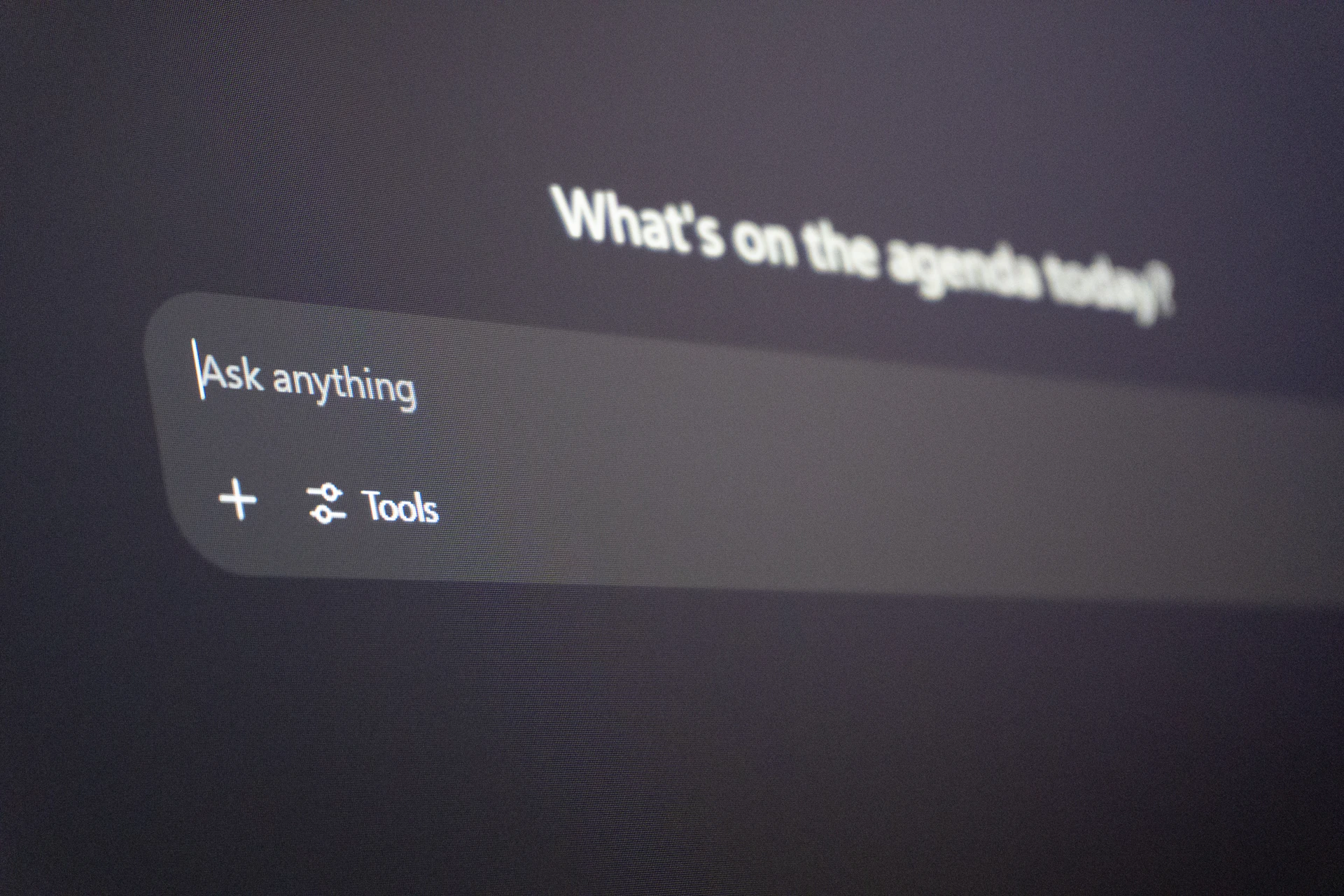 Digital interface with "ask anything" prompt.