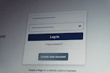 Facebook login screen with username and password fields.