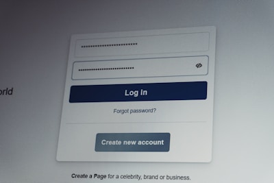 Facebook login screen with username and password fields.