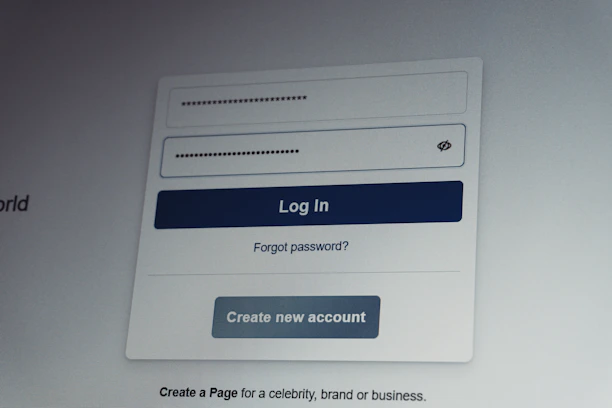 Facebook login screen with username and password fields.