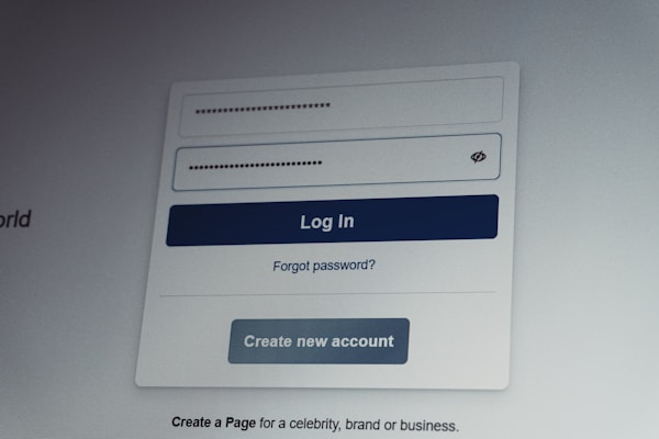 Facebook login screen with username and password fields.