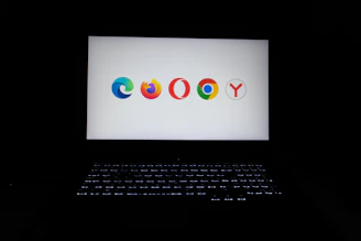 Browser logos displayed on a laptop screen.